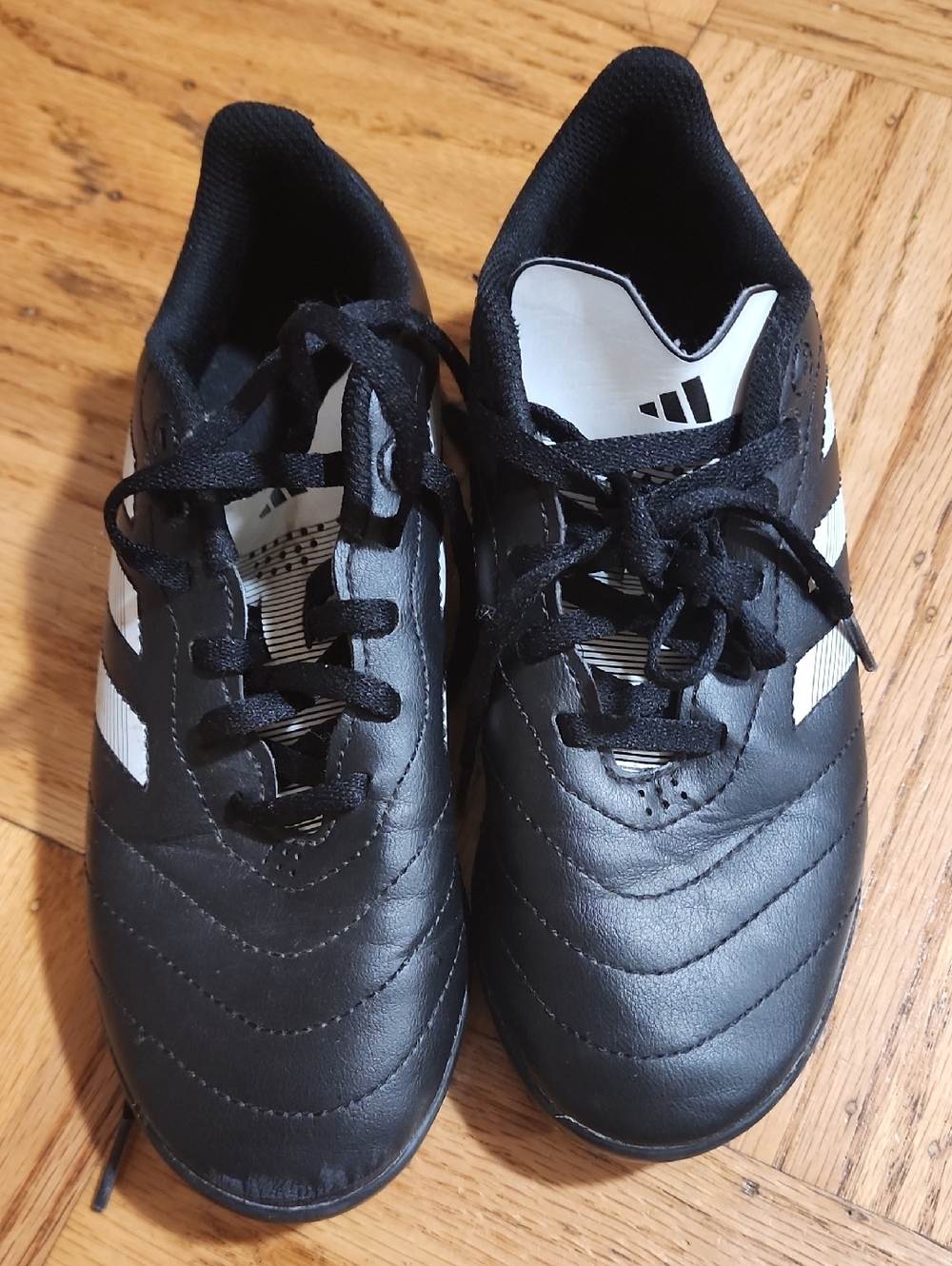Black and White kids Adidas soccer cleats